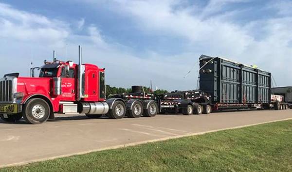 Lone Star Transportation hauling industrial construction equipment