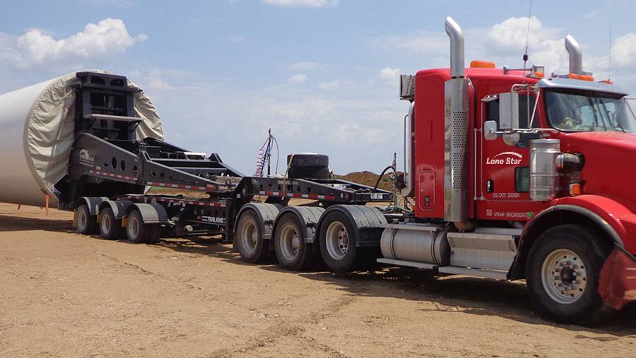 Lone Star truck hauling wind turbine tower