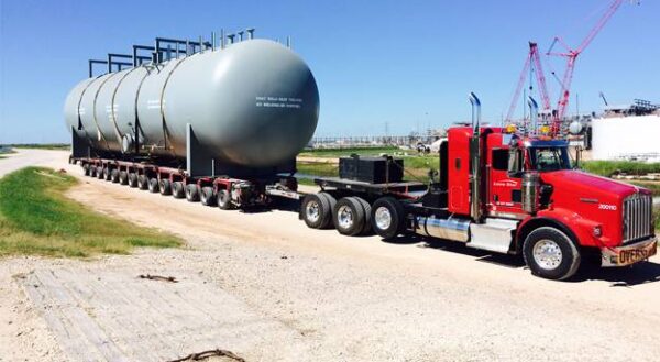 Lone Star Transportation truck hauling oversized oil tank