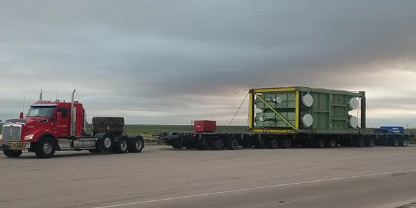 Lone Star truck transporting data center equipment on North American highway