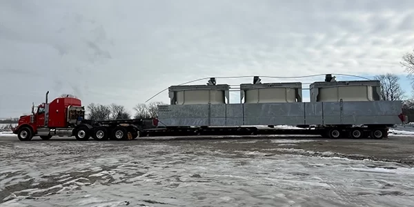 Lone Star truck hauling 3 pieces of data center equipment